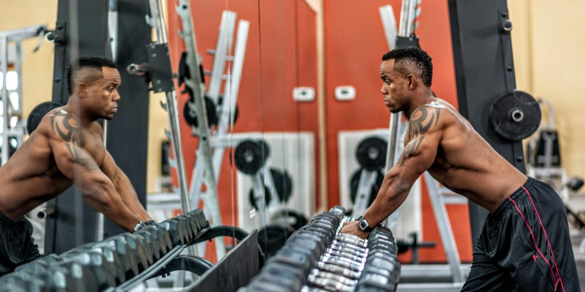 Photo by Joseph Buchanan: https://www.pexels.com/photo/man-in-red-and-black-shorts-1144864/