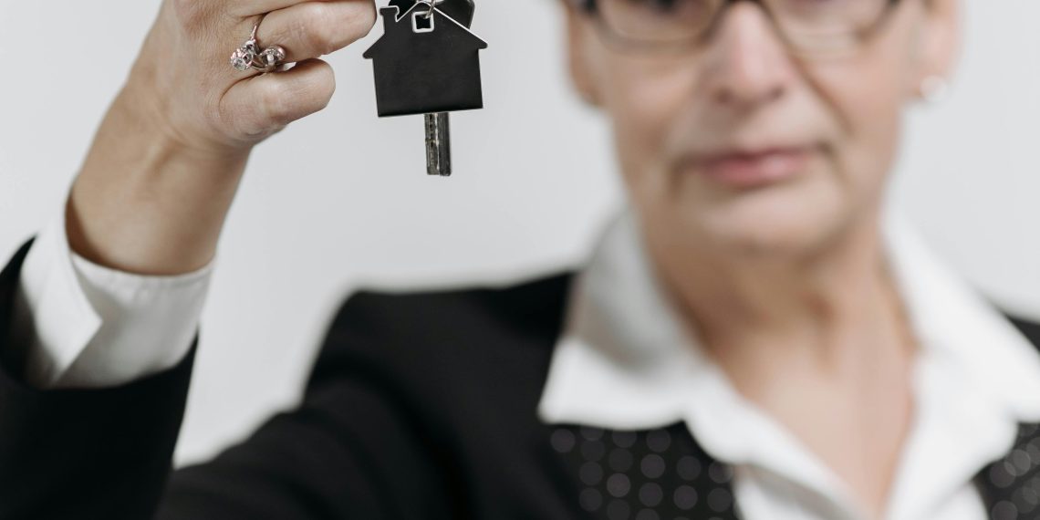 Photo by Pavel Danilyuk: https://www.pexels.com/photo/real-estate-agent-with-key-on-hand-7937683/