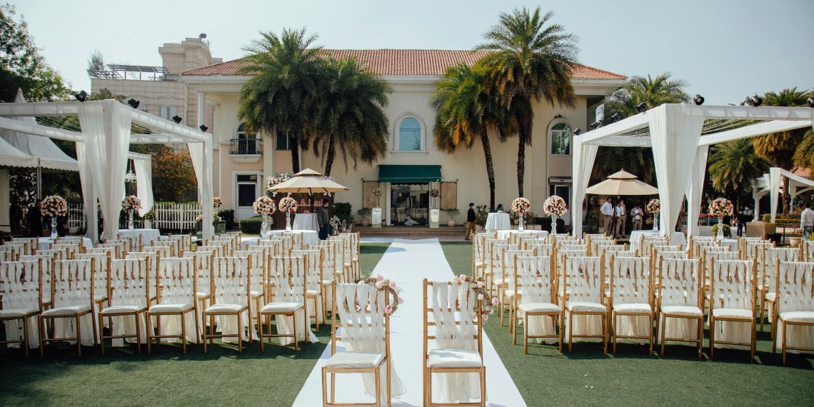 Photo by The Visionary Vows: https://www.pexels.com/photo/elegant-outdoor-wedding-venue-with-ceremony-setup-32854448/