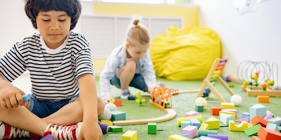 Photo by Yan Krukau: https://www.pexels.com/photo/two-boys-playing-with-wooden-blocks-in-a-room-8612970/
