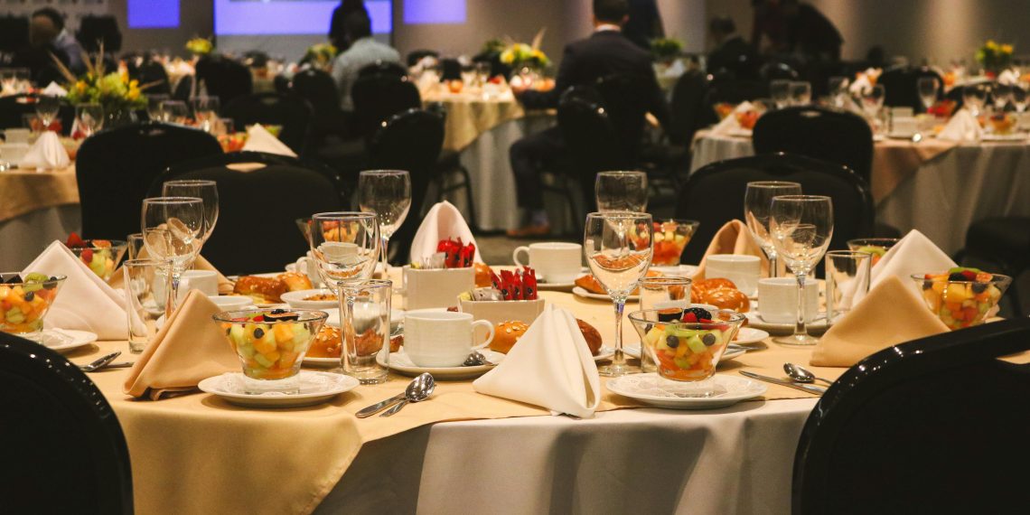 Photo by Jonathan Valdes: https://www.pexels.com/photo/elegant-banquet-hall-with-formal-table-setting-29410669/